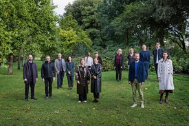GCC Founding Committee surrounded by grass and trees