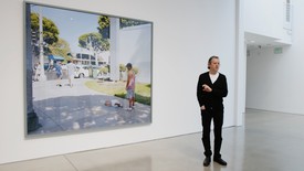 Jeff Wall at Gagosien, Beverly Hills, in front of his photography