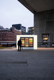 Josh Kline, Skittles, 2014, commercial fridge, lightbox, and blended liquids in bottles, 86 ½ × 127 ½ × 41 inches (219.7 × 323.9 × 104.1 cm) © Josh Kline. Photo: © Timothy Schenck