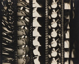 Vertical film strips from Man Ray's films.