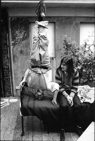 Black and white image of Bruce Bernard, Lucian Freud Standing on His Head, with Daughter Bella, 1983