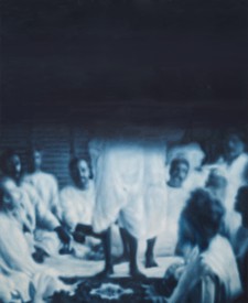 A painting in dark blue and white. The image depicts a group of men in white linen encircling a platform on which a couple of them are standing. The standing figures are cut off from the waist up as the top half of the painting dissolves into solid midnight blue.