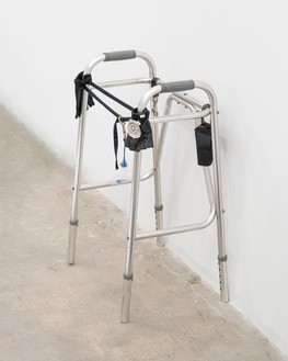 Cady Noland, untitled, 1986 Metal walker, metal police badge, leather gloves and case, denim strap, leather strap with metal clip, and nylon strap with metal clip, 32 × 30 × 24 inches (81.3 × 76.2 × 61 cm)© Cady Noland. Photo: Owen Conway